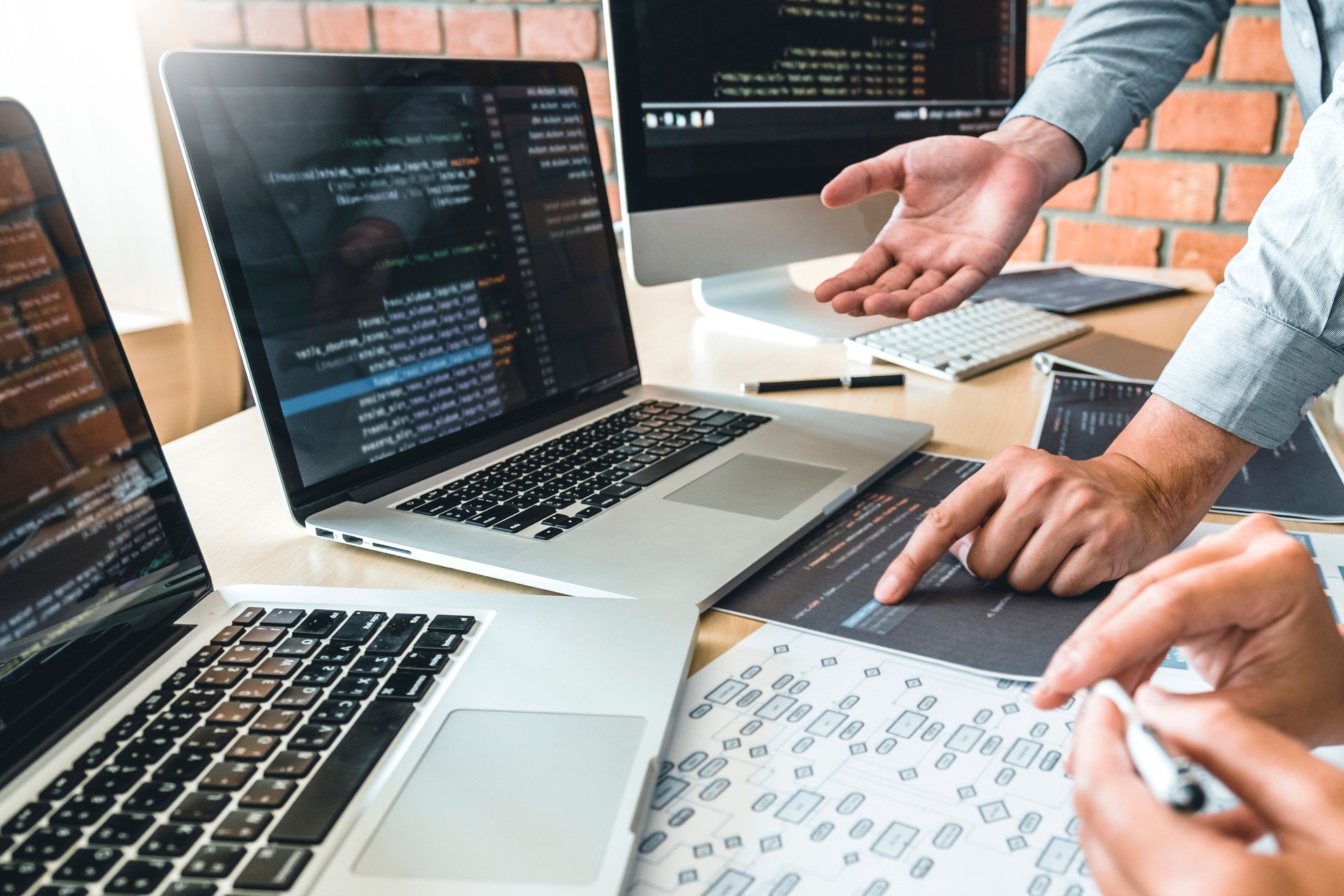 Developing programmer Development Website design and coding technologies working in software company office